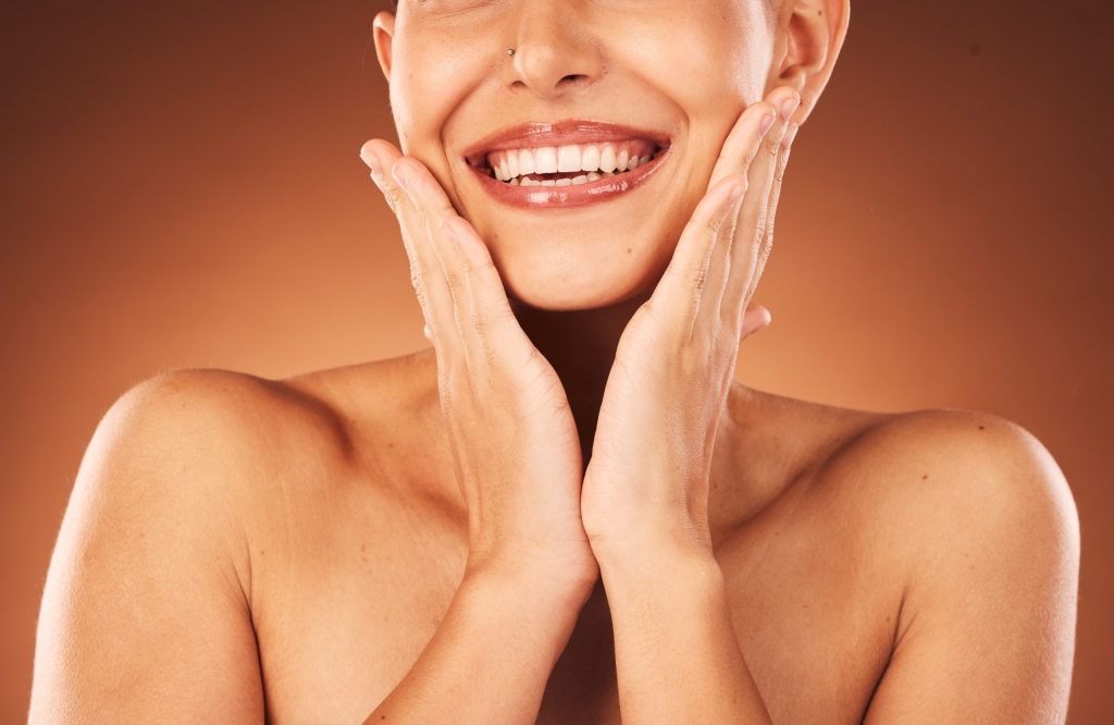 Woman with defined jaw and smile after Botox